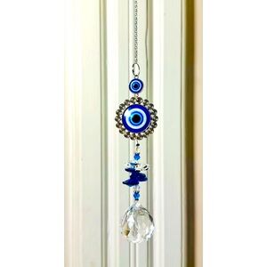 Evil eye hanging glass ornament 
Blue and Silver Decorative pendant